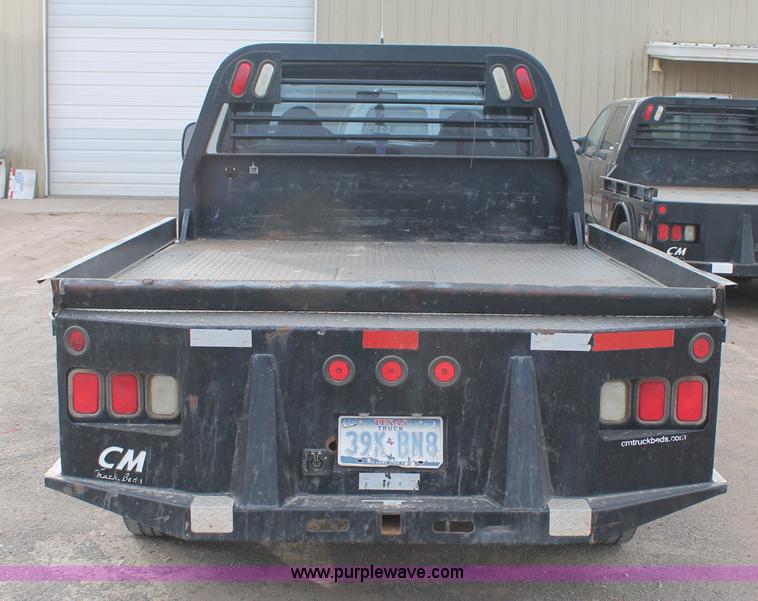 image for item H1595 2001 Ford F350 Super Duty Crew Cab flatbed truck