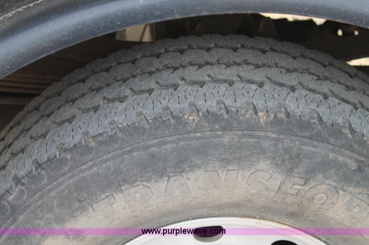 image for item H1595 2001 Ford F350 Super Duty Crew Cab flatbed truck