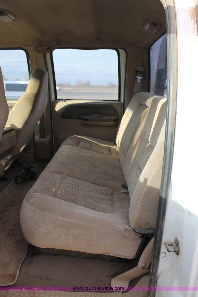 image for item H1595 2001 Ford F350 Super Duty Crew Cab flatbed truck