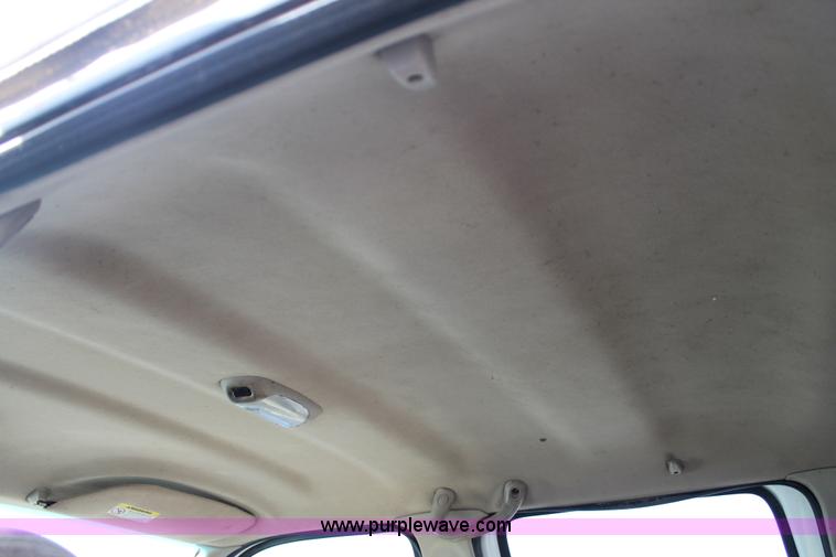 image for item H1595 2001 Ford F350 Super Duty Crew Cab flatbed truck