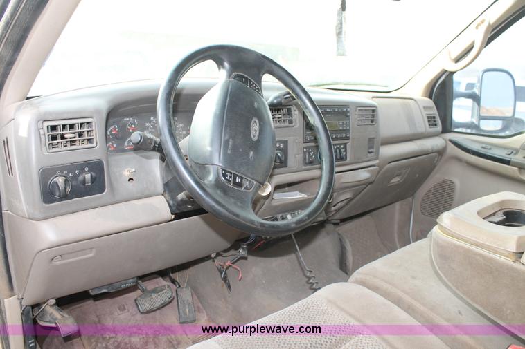 image for item H1595 2001 Ford F350 Super Duty Crew Cab flatbed truck