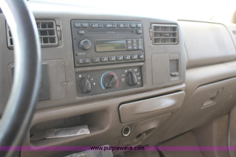 image for item H1595 2001 Ford F350 Super Duty Crew Cab flatbed truck