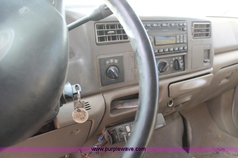 image for item H1595 2001 Ford F350 Super Duty Crew Cab flatbed truck