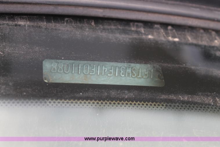 image for item H1595 2001 Ford F350 Super Duty Crew Cab flatbed truck