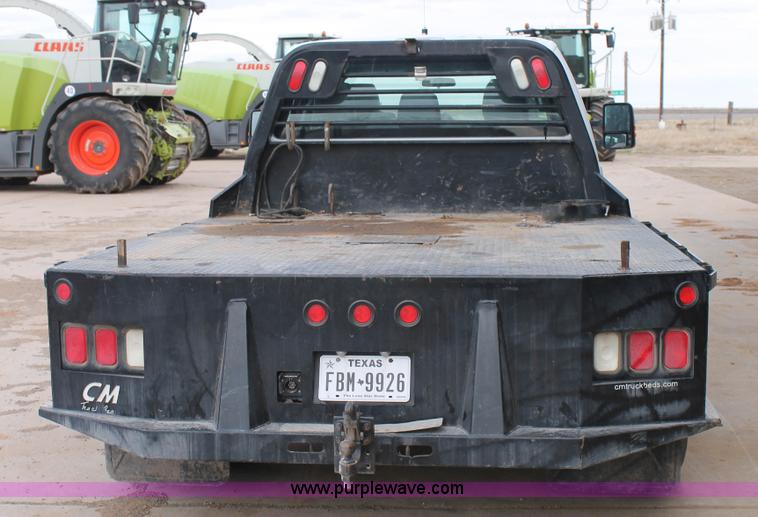 image for item H1602 2014 Ford F350 Super Duty Crew Cab flatbed truck