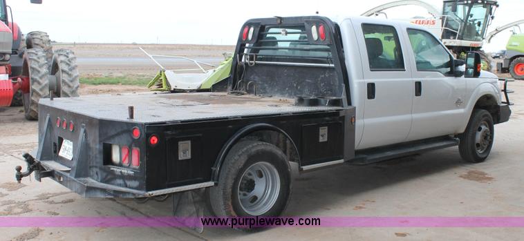 image for item H1602 2014 Ford F350 Super Duty Crew Cab flatbed truck