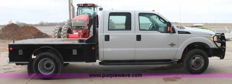 image for item H1602 2014 Ford F350 Super Duty Crew Cab flatbed truck