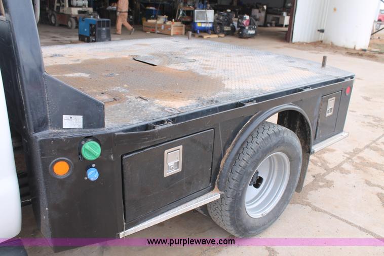 image for item H1602 2014 Ford F350 Super Duty Crew Cab flatbed truck