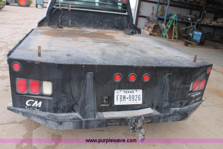 image for item H1602 2014 Ford F350 Super Duty Crew Cab flatbed truck