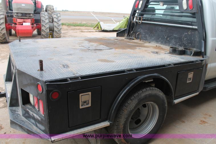 image for item H1602 2014 Ford F350 Super Duty Crew Cab flatbed truck