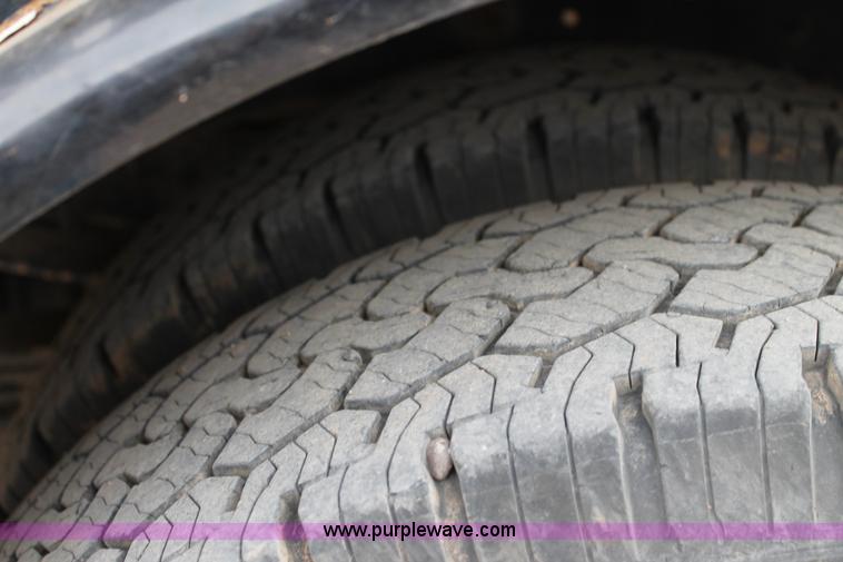 image for item H1602 2014 Ford F350 Super Duty Crew Cab flatbed truck