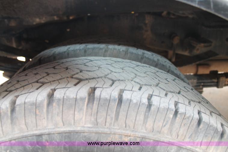 image for item H1602 2014 Ford F350 Super Duty Crew Cab flatbed truck