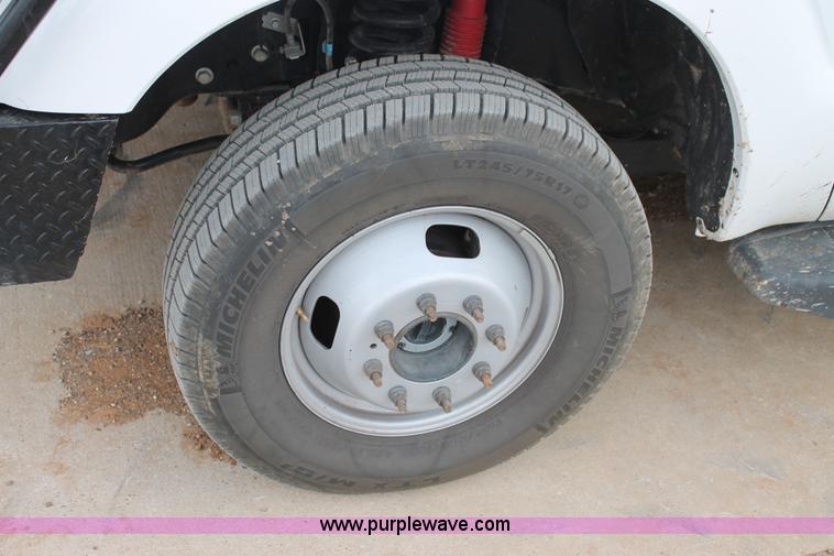 image for item H1602 2014 Ford F350 Super Duty Crew Cab flatbed truck