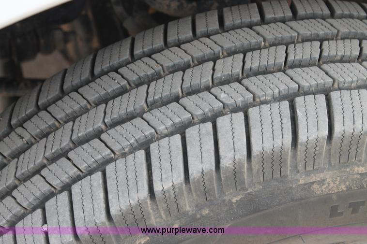 image for item H1602 2014 Ford F350 Super Duty Crew Cab flatbed truck