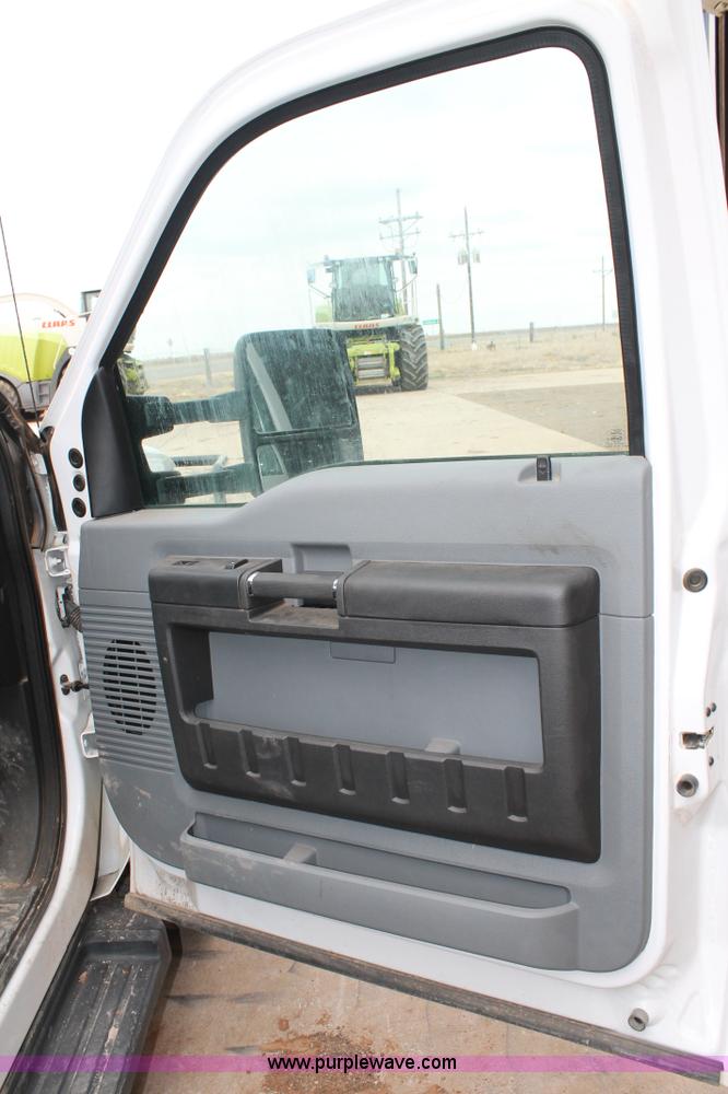 image for item H1602 2014 Ford F350 Super Duty Crew Cab flatbed truck