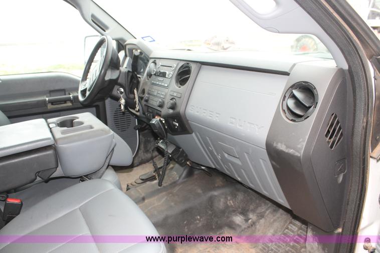 image for item H1602 2014 Ford F350 Super Duty Crew Cab flatbed truck