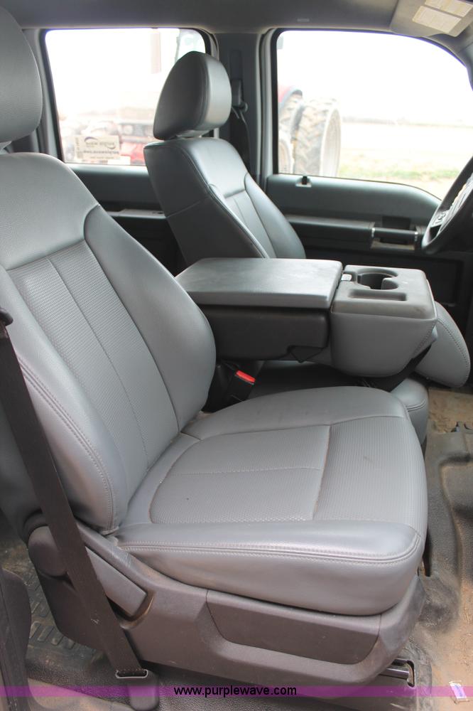 image for item H1602 2014 Ford F350 Super Duty Crew Cab flatbed truck