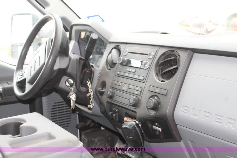 image for item H1602 2014 Ford F350 Super Duty Crew Cab flatbed truck