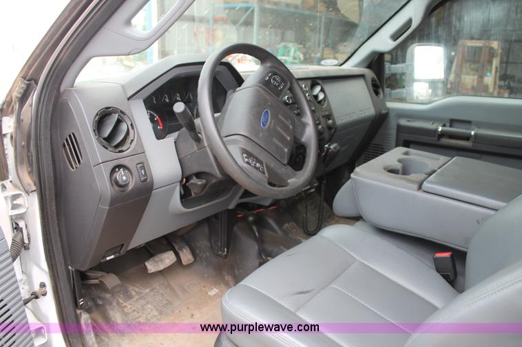 image for item H1602 2014 Ford F350 Super Duty Crew Cab flatbed truck