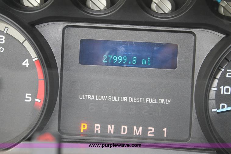 image for item H1602 2014 Ford F350 Super Duty Crew Cab flatbed truck