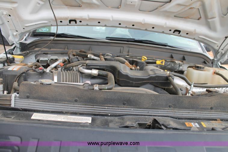 image for item H1602 2014 Ford F350 Super Duty Crew Cab flatbed truck