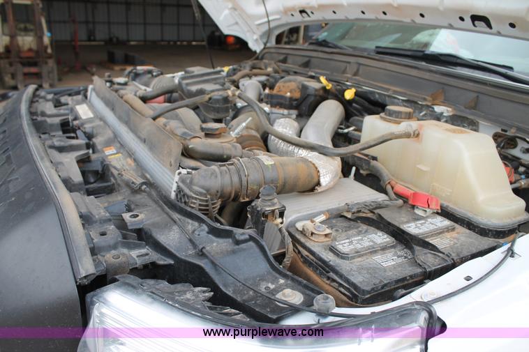 image for item H1602 2014 Ford F350 Super Duty Crew Cab flatbed truck