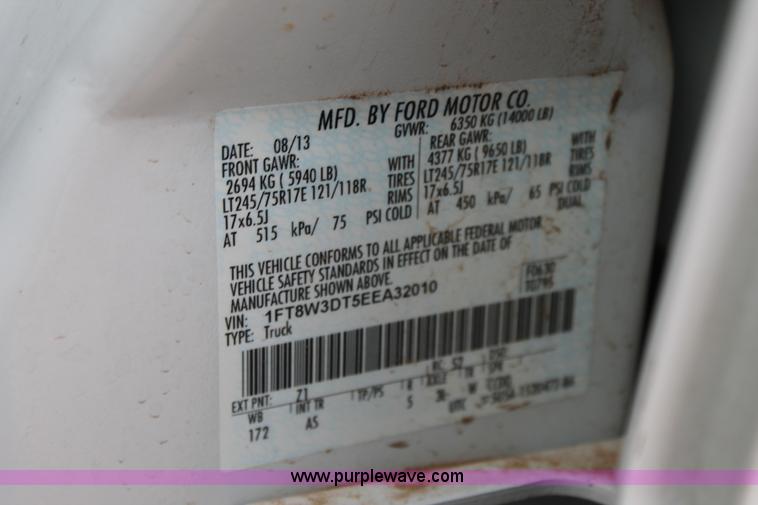 image for item H1602 2014 Ford F350 Super Duty Crew Cab flatbed truck