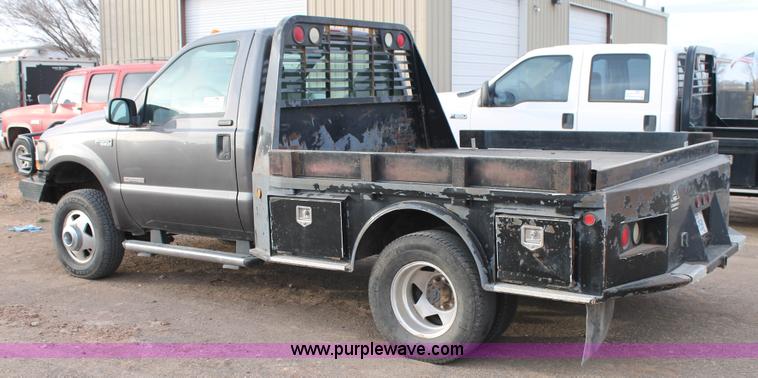 image for item H1604 2004 Ford F350 Super Duty flatbed truck