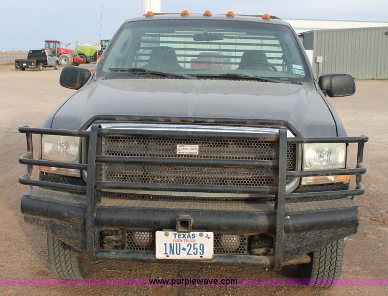 image for item H1604 2004 Ford F350 Super Duty flatbed truck