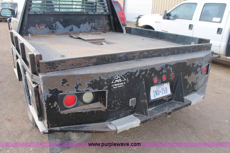image for item H1604 2004 Ford F350 Super Duty flatbed truck