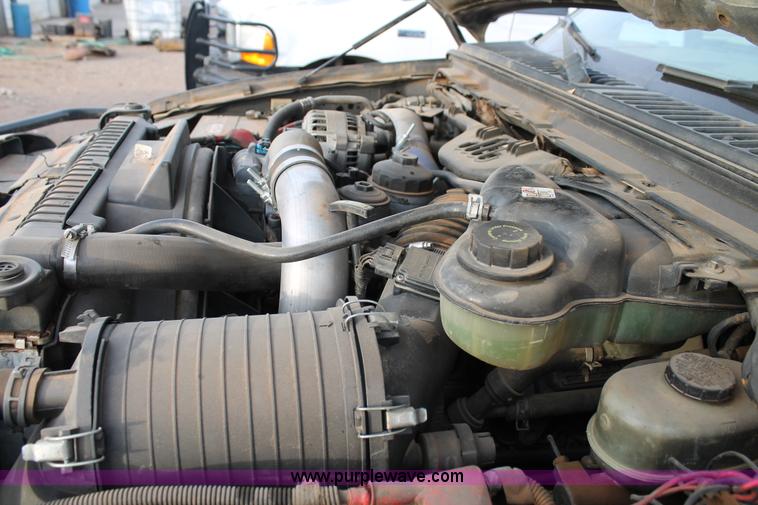 image for item H1604 2004 Ford F350 Super Duty flatbed truck