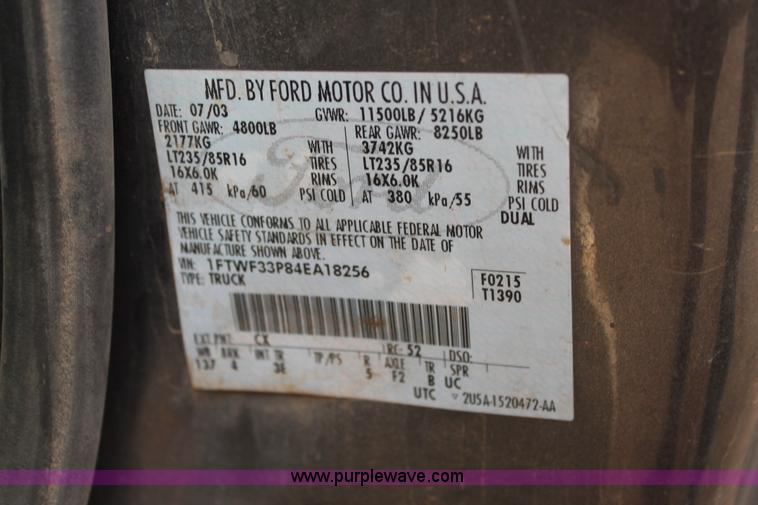 image for item H1604 2004 Ford F350 Super Duty flatbed truck