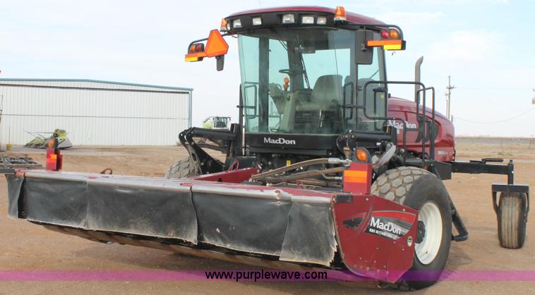 image for item H1608 2013 MacDon M205 self-propelled windrower