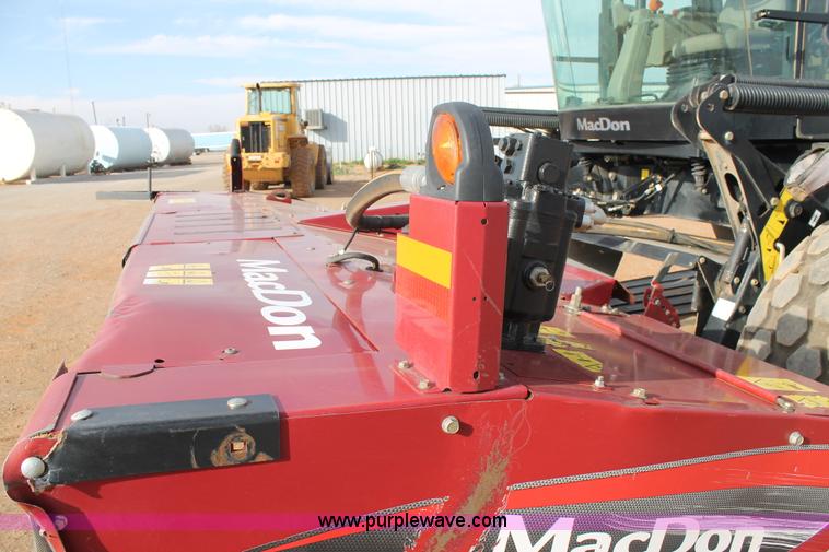 image for item H1608 2013 MacDon M205 self-propelled windrower