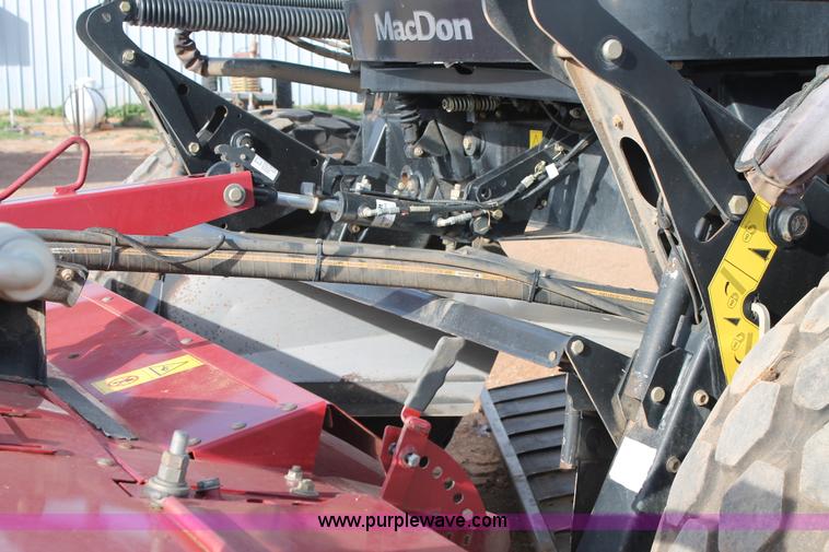 image for item H1608 2013 MacDon M205 self-propelled windrower