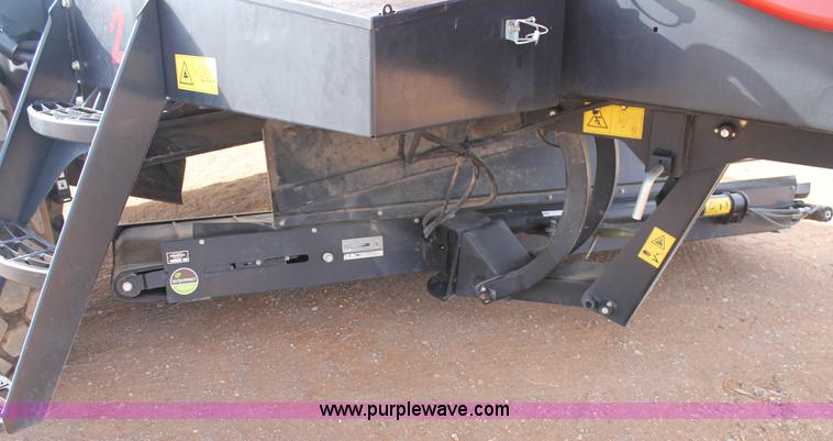 image for item H1608 2013 MacDon M205 self-propelled windrower