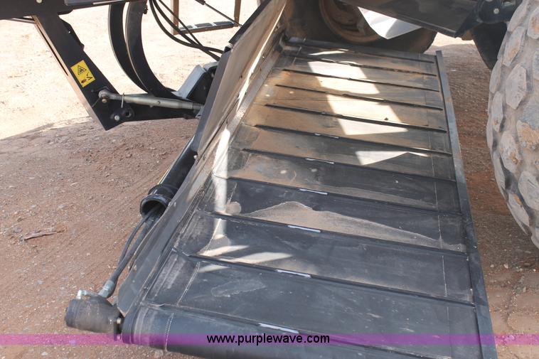 image for item H1608 2013 MacDon M205 self-propelled windrower