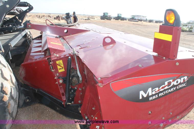 image for item H1608 2013 MacDon M205 self-propelled windrower