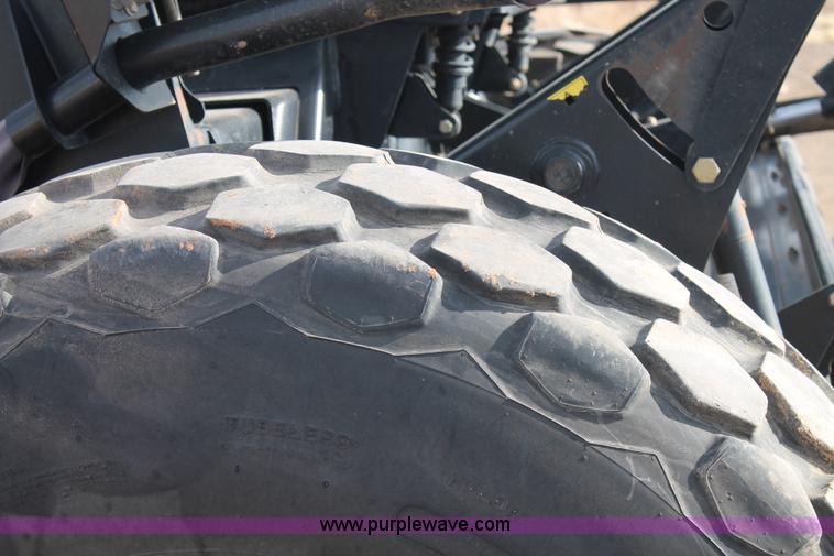 image for item H1608 2013 MacDon M205 self-propelled windrower