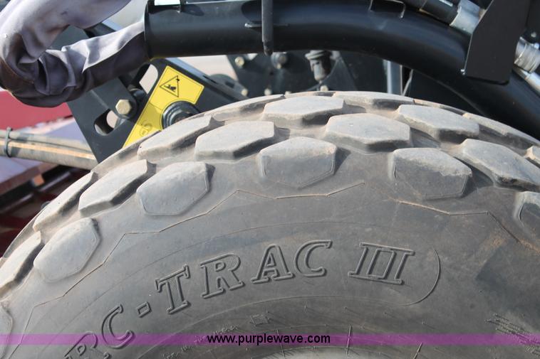 image for item H1608 2013 MacDon M205 self-propelled windrower