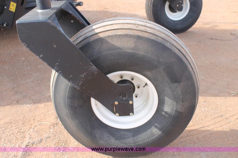 image for item H1608 2013 MacDon M205 self-propelled windrower