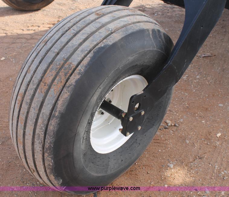 image for item H1608 2013 MacDon M205 self-propelled windrower