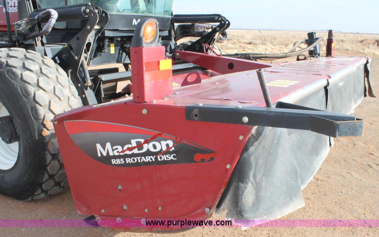 image for item H1608 2013 MacDon M205 self-propelled windrower