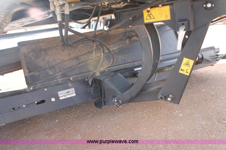 image for item H1608 2013 MacDon M205 self-propelled windrower