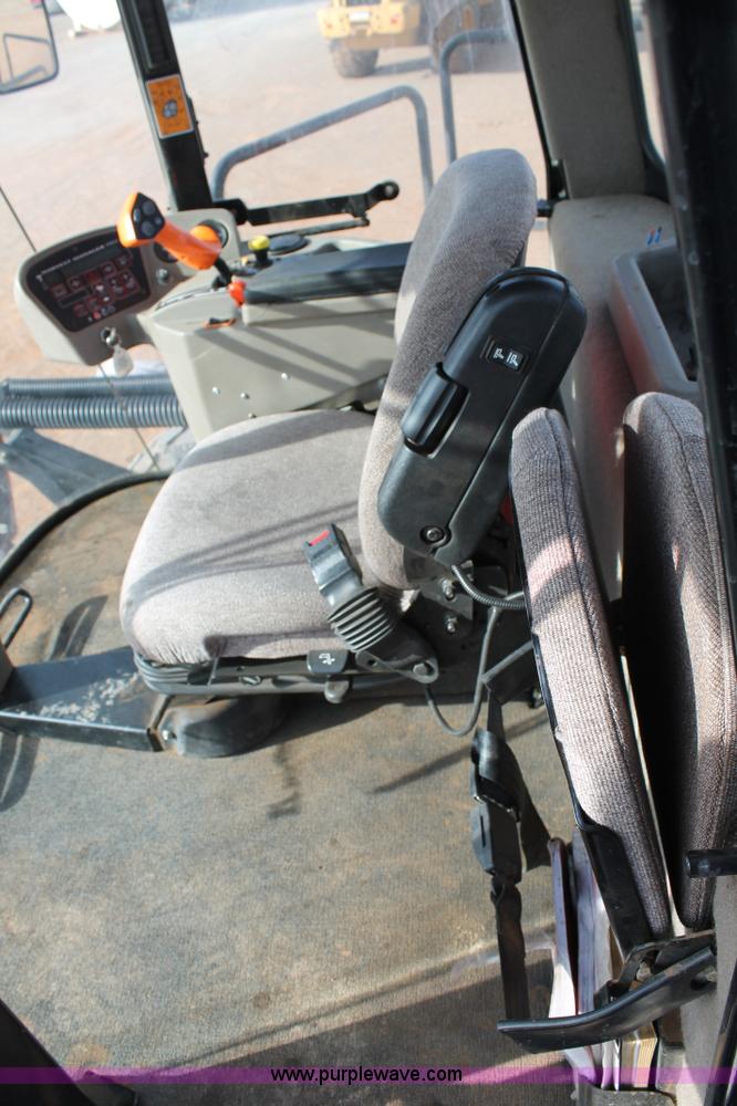 image for item H1608 2013 MacDon M205 self-propelled windrower