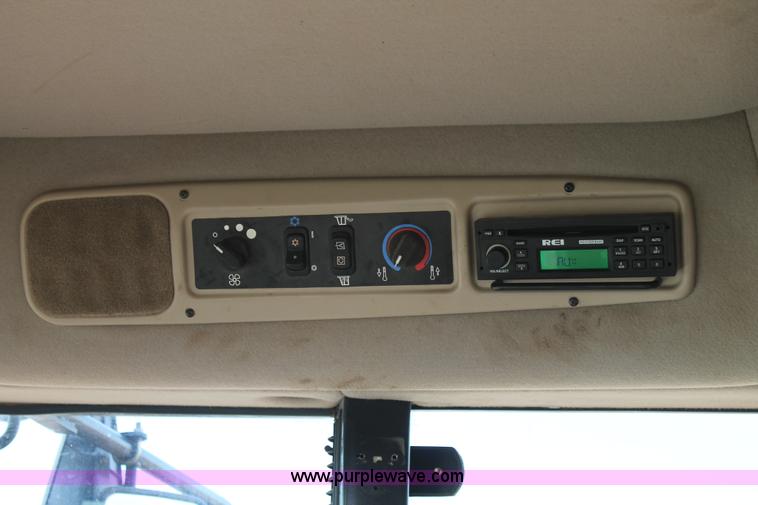 image for item H1608 2013 MacDon M205 self-propelled windrower