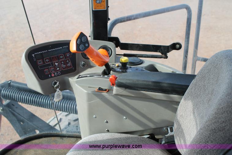 image for item H1608 2013 MacDon M205 self-propelled windrower