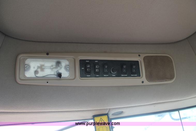 image for item H1608 2013 MacDon M205 self-propelled windrower