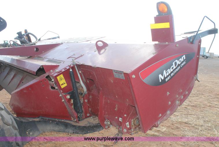 image for item H1611 2013 MacDon M205 self-propelled windrower