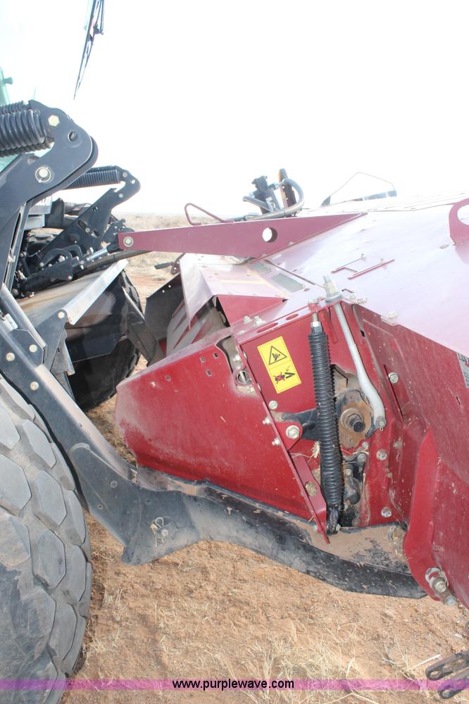 image for item H1611 2013 MacDon M205 self-propelled windrower